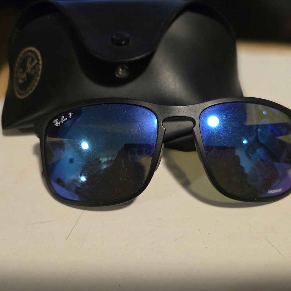 Ray-Ban Black Frames with Reflective Blue Lenses